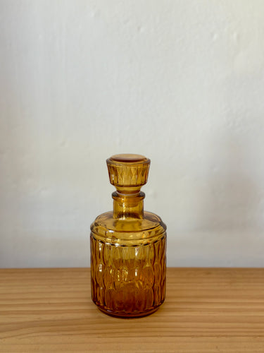 Vintage amber glass round decanter