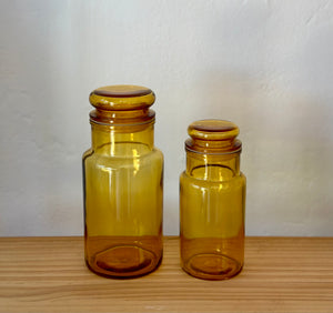 Pair of amber lidded jars