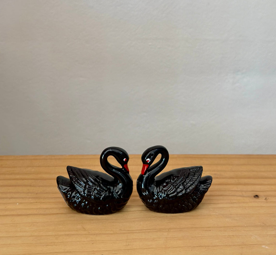 Pair of vintage ceramic black swans