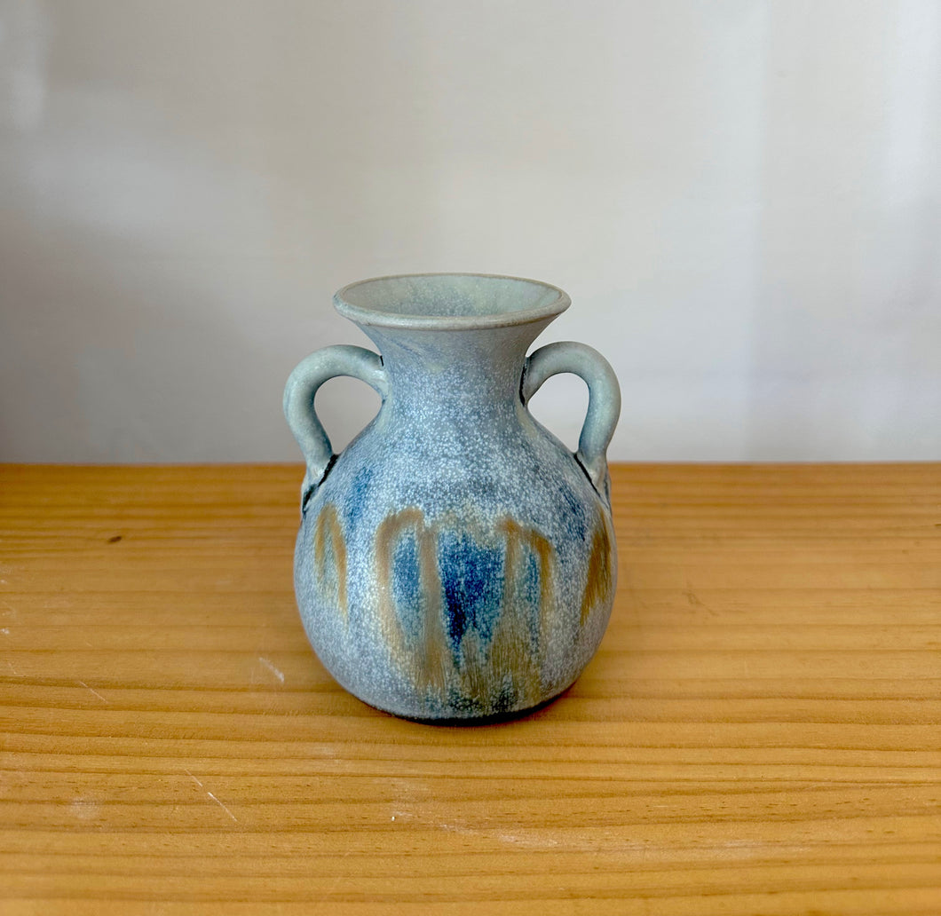 Small double handle pottery vase