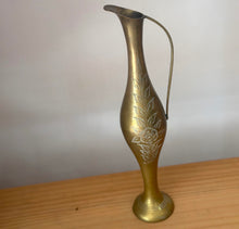 Tall brass pitcher