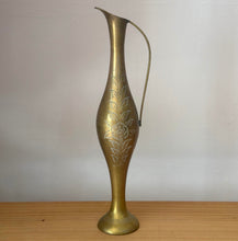 Tall brass pitcher