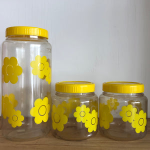 Retro yellow daisy canisters x 3