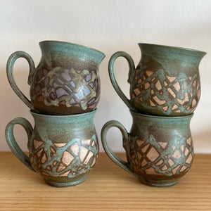 Set of 4 pottery mugs