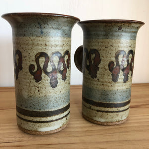 Tall pottery mugs