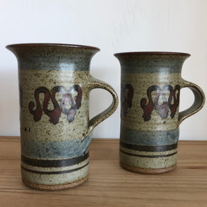 Tall pottery mugs