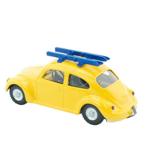 Tin toy yellow VW beetle ski