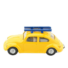 Tin toy yellow VW beetle ski